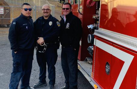 Pilot Rock Firefighter Eli Hernandez, Officer Badal and Umatilla County Fire District 1 Division Chief Richard Cearns
